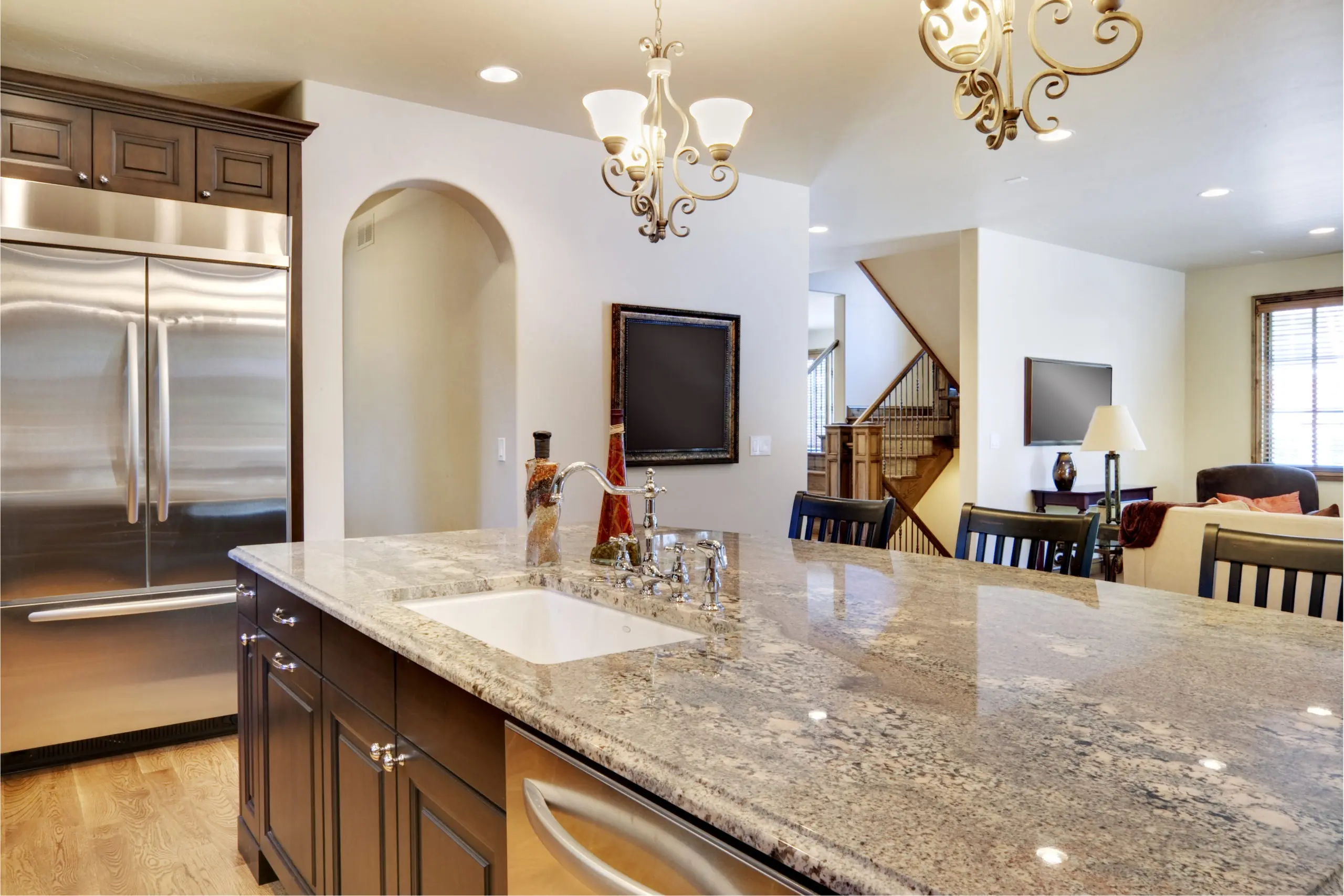 Kitchen with view looking over center island into great room Granite Kitchen Countertops Bucks County PA