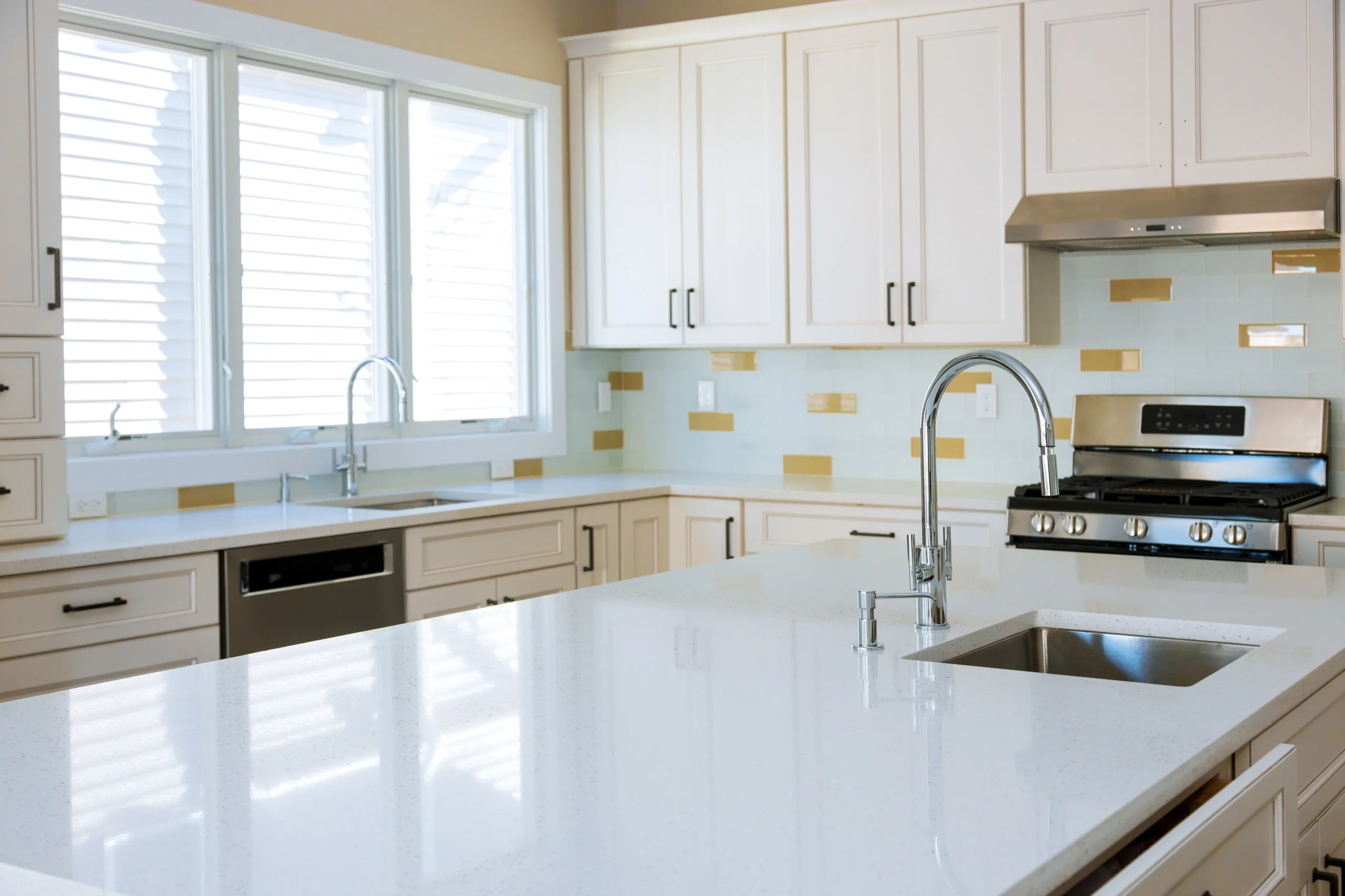 White quartz countertop with glossy finish in a contemporary kitchen